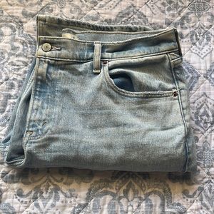 Curve Love Light washed low rise flare jeans